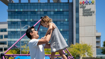 Father and daughter outside of UCSF Benioff Children's Hospital