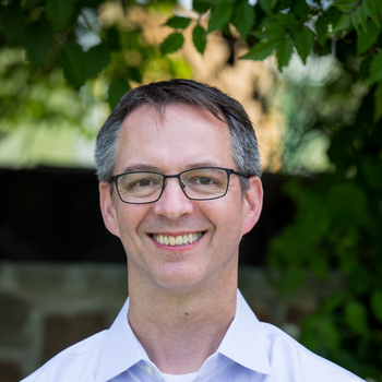 Headshot of Christopher Fee