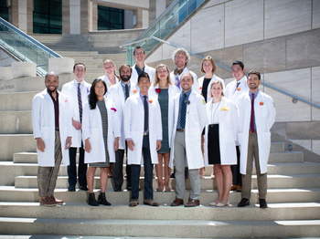Group photo of class of 2021 graduates standing on stairs