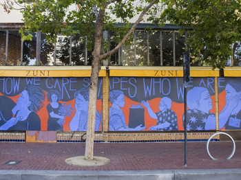 finished mural on a wall of medical personal and patients