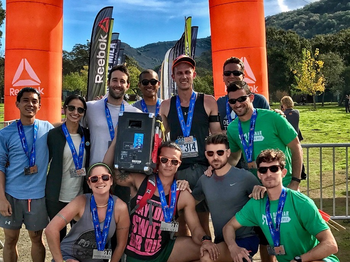 Group of runners in front of the finish line